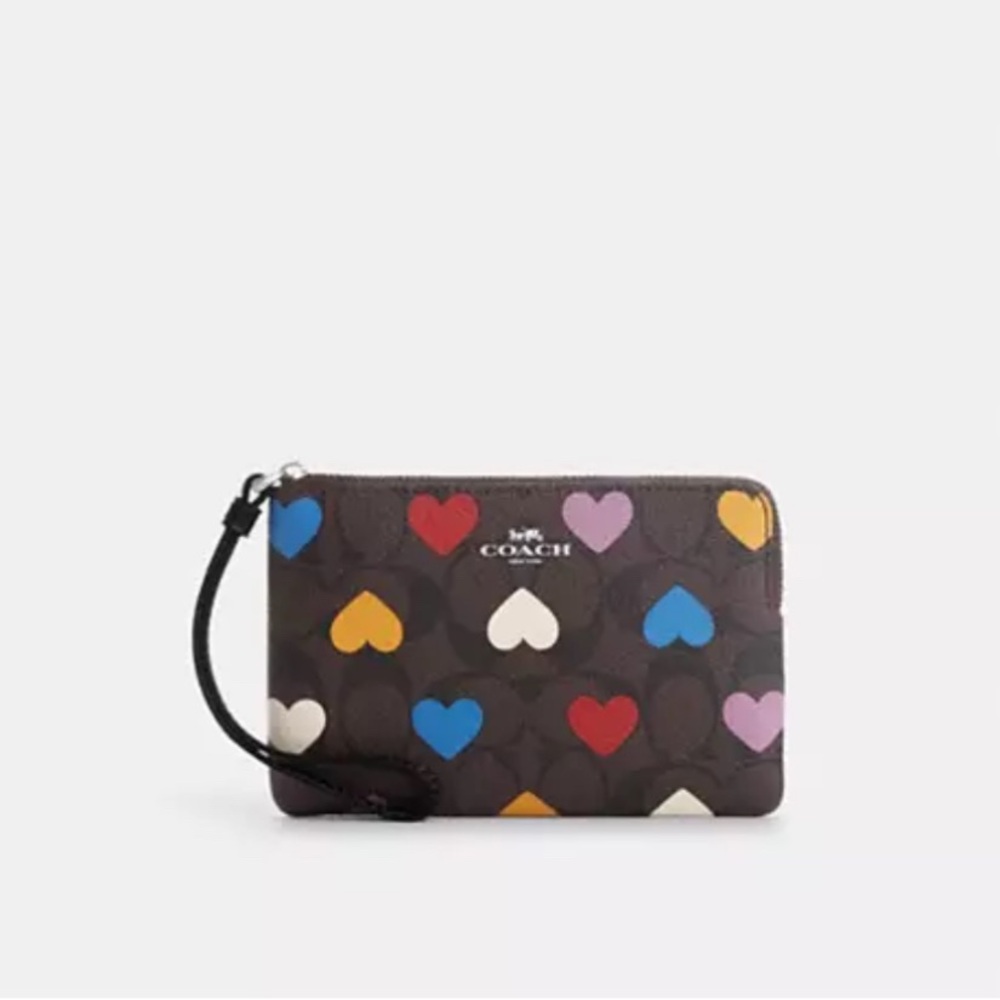 Coach Corner Zip Wrislet in Signature Brown with Heart Print